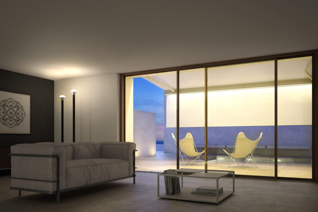 Tenda da sole vista dall'interno al tramonto, con luce calda e atmosfera accogliente